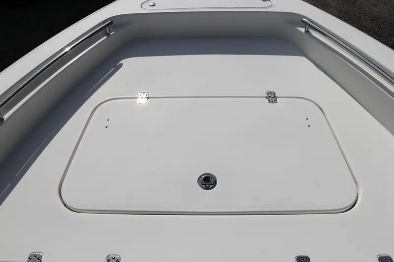 Slide: The Image of 2018 ShearWater 25 LTZ boat deck with storage compartment and stainless steel rails. - 39