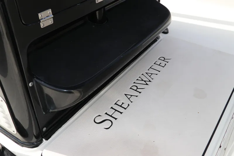 Slide: The Image of 2018 ShearWater 25 LTZ boat deck with logo in black and white. - 31