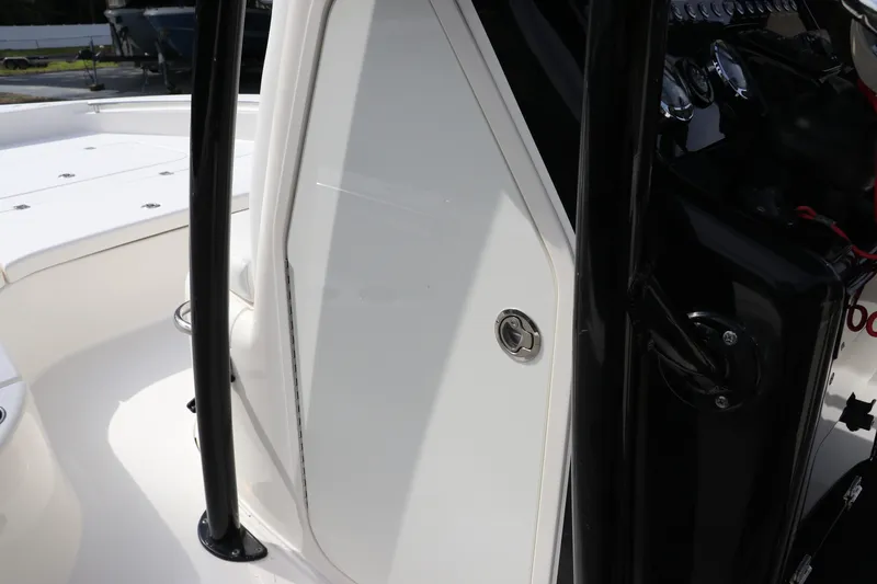 Slide: The Image of 2018 ShearWater 25 LTZ boat interior with sleek design and modern controls. - 32