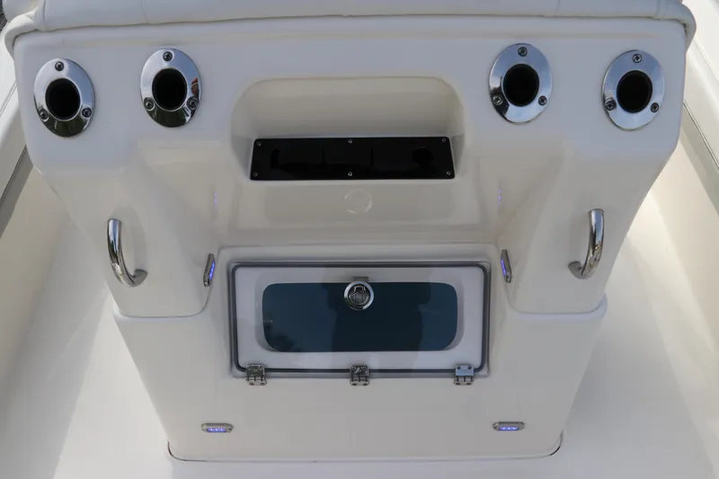 Slide: The Image of The image shows the cockpit of a 2018 ShearWater 25 LTZ with rod holders and storage. - 16