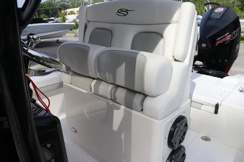 Slide: The Image of 2018 ShearWater 25 LTZ boat interior with cushioned seating and Mercury Pro XS engine. - 20