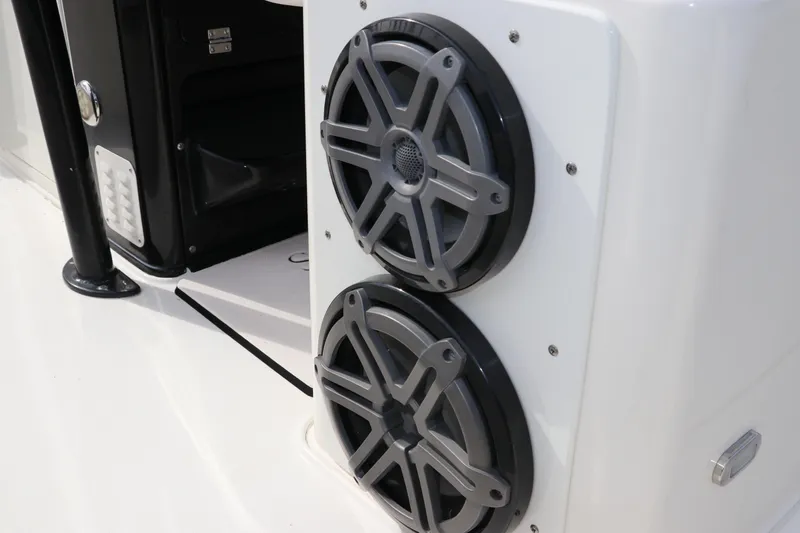 Slide: The Image of 2018 ShearWater 25 LTZ boat speakers, sleek design, high-quality audio system. - 18