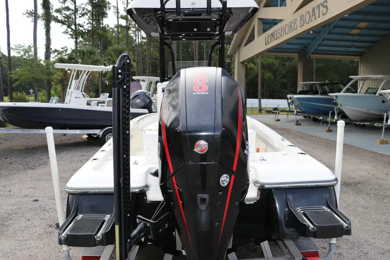 Slide: The Image of 2018 ShearWater 25 LTZ boat with powerful outboard motor at Longshore Boats dealership. - 6