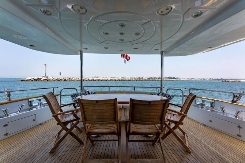Slide: The Image of Luxury yacht Azimut 85 Ultimate 2000, featuring elegant deck seating with ocean view. - 8