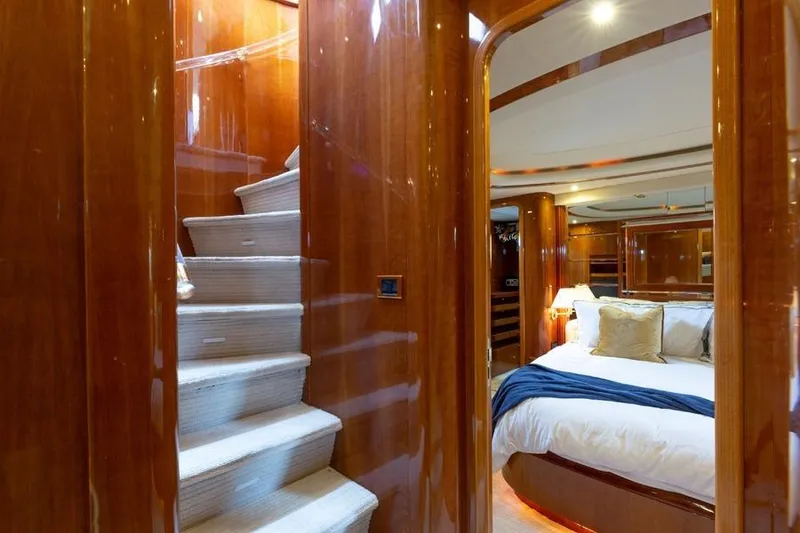 Slide: The Image of Luxurious interior of 2000 Azimut 85 Ultimate yacht with elegant wood finishes. - 29