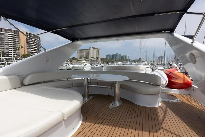 Slide: The Image of Luxurious Azimut 85 Ultimate yacht deck with seating, marina view, and modern design. - 16