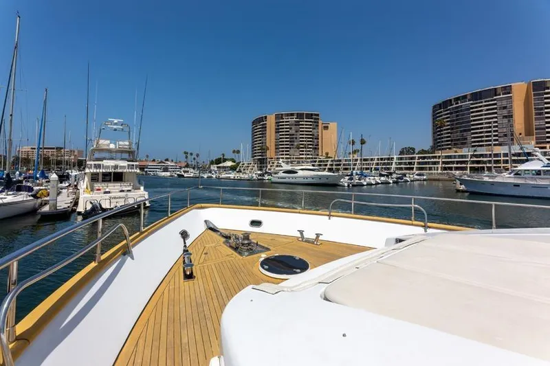 Slide: The Image of Azimut 85 Ultimate yacht from 2000 docked in a marina with modern buildings. - 6