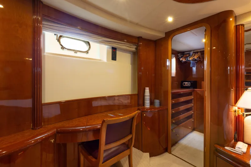Slide: The Image of Luxurious wooden interior of 2000 Azimut 85 Ultimate yacht with desk and closet space. - 48