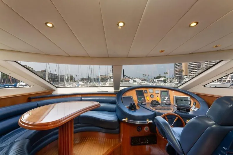 Slide: The Image of Luxurious interior of 2000 Azimut 85 Ultimate yacht with elegant helm and seating area. - 62