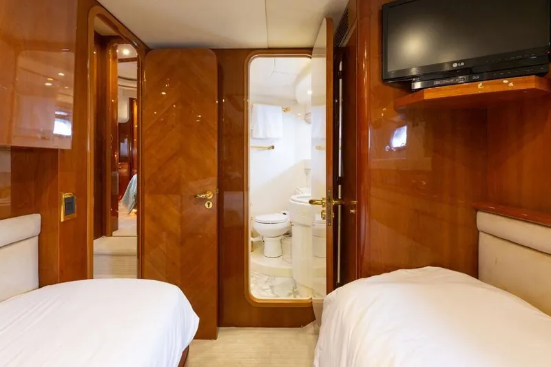 Slide: The Image of Luxurious interior of 2000 Azimut 85 Ultimate yacht with twin beds and ensuite bathroom. - 36