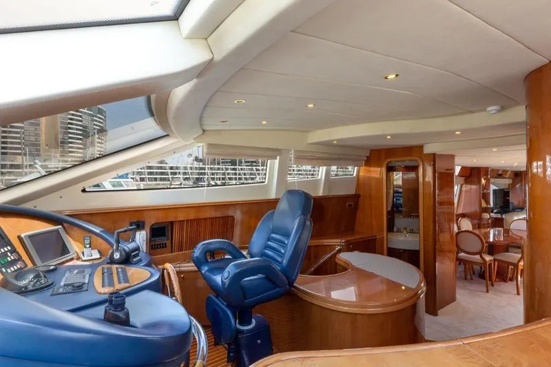 Slide: The Image of Luxurious interior of a 2000 Azimut 85 Ultimate yacht with elegant wood finishes. - 61