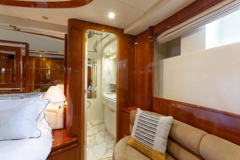 Slide: The Image of Luxurious interior of 2000 Azimut 85 Ultimate yacht with elegant wood finishes. - 47