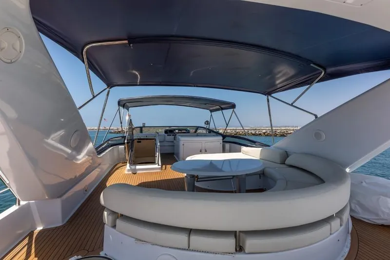 Slide: The Image of Luxurious 2000 Azimut 85 Ultimate yacht deck with seating and ocean view. - 20