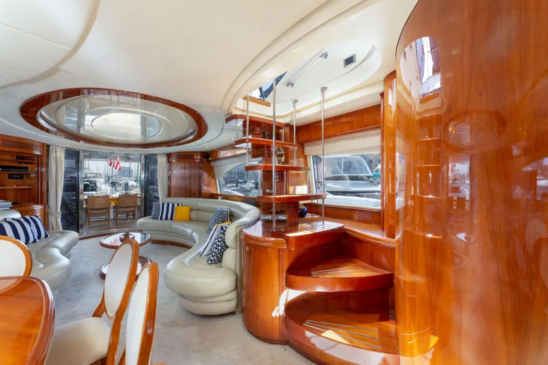 Slide: The Image of Luxurious interior of 2000 Azimut 85 Ultimate yacht with elegant wood finishes and modern seating. - 53