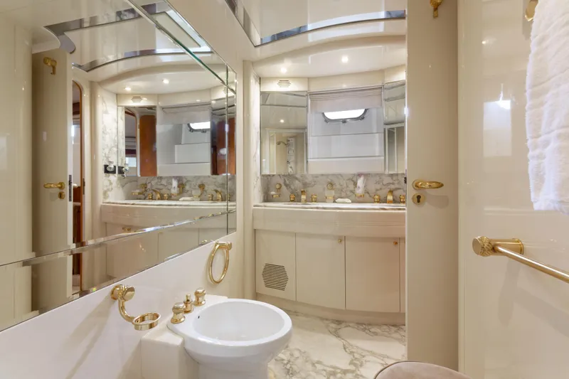 Slide: The Image of Luxurious bathroom on 2000 Azimut 85 Ultimate yacht with marble and gold accents. - 45