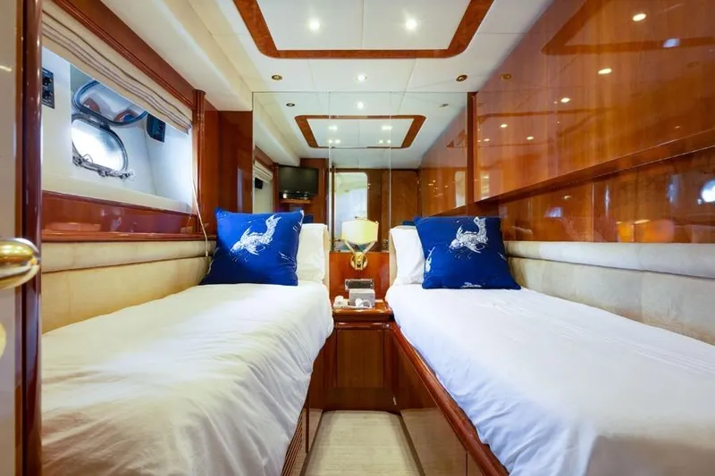 Slide: The Image of Luxurious twin cabin interior of 2000 Azimut 85 Ultimate yacht with elegant wood finish. - 37