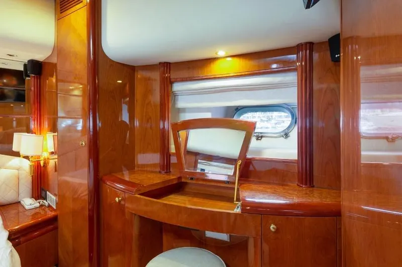 Slide: The Image of Luxurious wooden interior of 2000 Azimut 85 Ultimate yacht with vanity and window. - 42