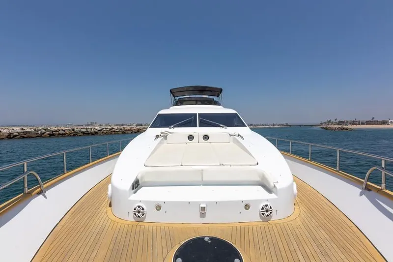 Slide: The Image of Azimut 85 Ultimate yacht, 2000 model, cruising on open water under clear blue skies. - 5