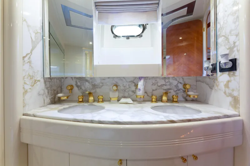 Slide: The Image of Luxurious marble bathroom with gold fixtures on a 2000 Azimut 85 Ultimate yacht. - 39