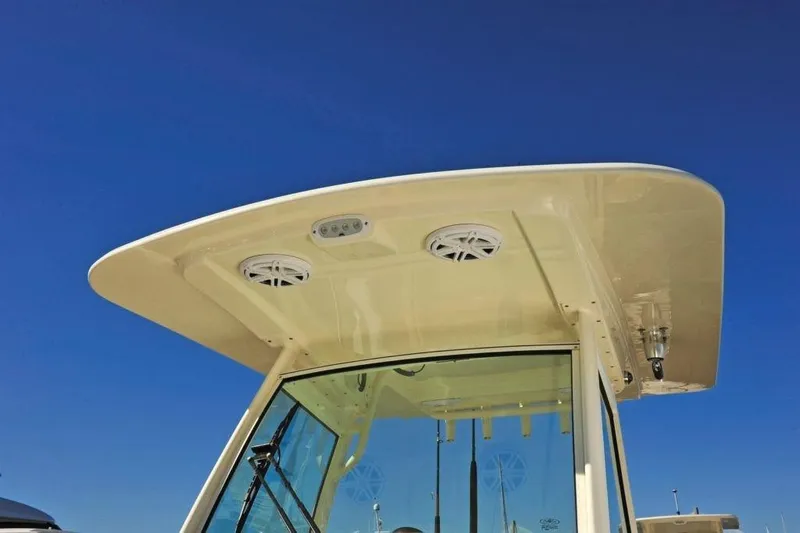 Slide: The Image of Scout 277 LXF 2020: Hardtop with speakers and lighting, set against a blue sky. - 19