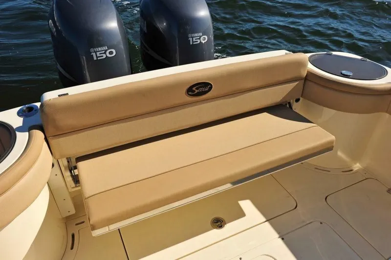 Slide: The Image of The 2020 Scout 277 LXF features a beige fold-down bench seat at the stern with two Yamaha engines. - 8