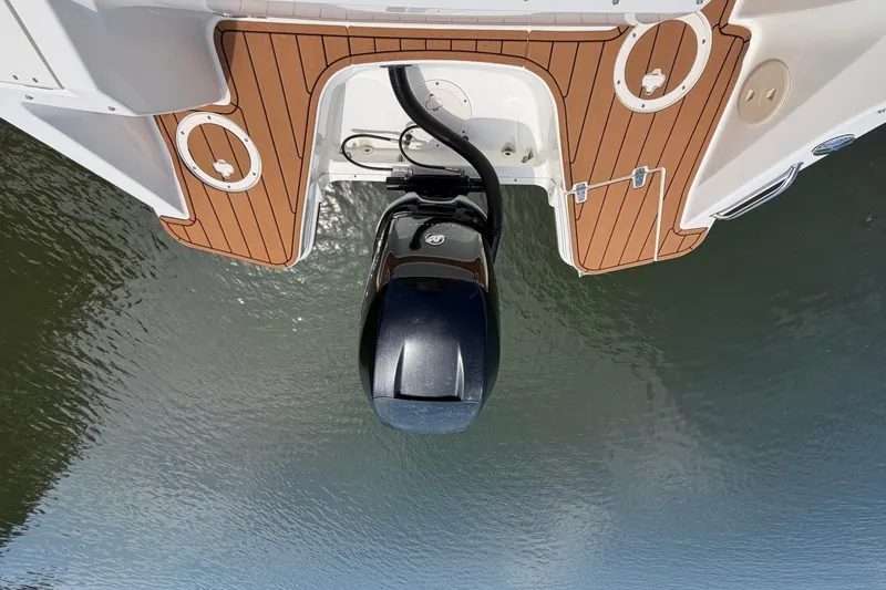 Slide: The Image of Overhead view of 2022 Boston Whaler 240 Vantage boat engine and deck. - 25