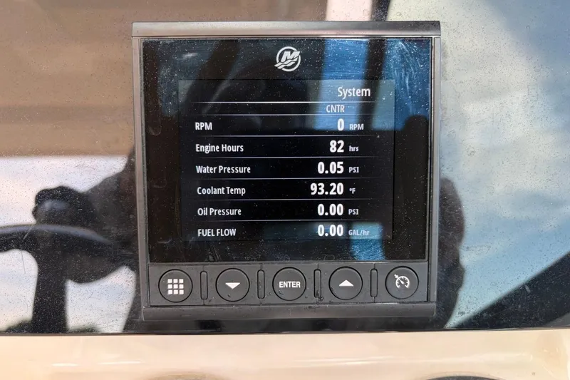 Slide: The Image of Display screen of a 2022 Boston Whaler 240 Vantage showing engine metrics. - 15