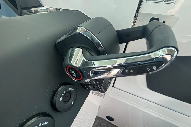 Slide: The Image of Throttle control of 2025 Axopar 29 XC Cross Cabin boat, featuring sleek design and functionality. - 34
