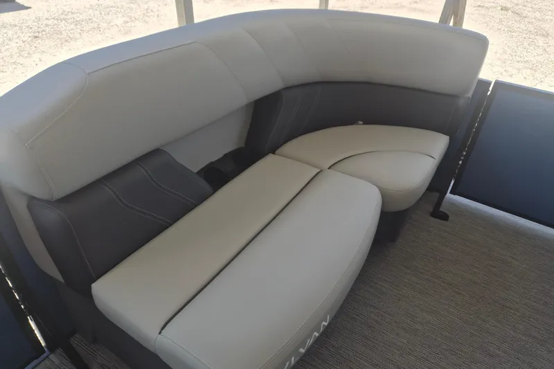 Slide: The Image of 2026 Sylvan Mirage Fish 820 Party Fish boat seating, featuring plush, light gray upholstery. - 4