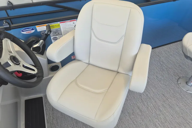 Slide: The Image of Captain's chair and helm of 2026 Sylvan Mirage Fish 820 Party Fish boat. - 11