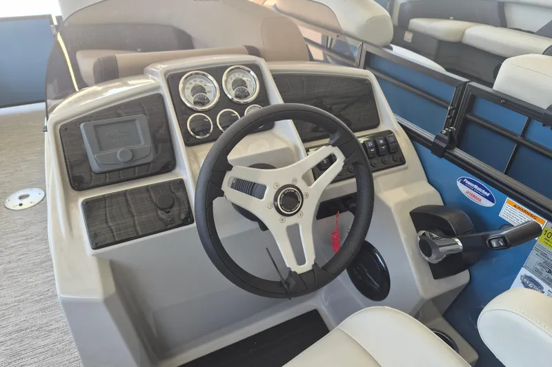 Slide: The Image of Steering console of 2026 Sylvan Mirage Fish 820 Party Fish boat with gauges and controls. - 10