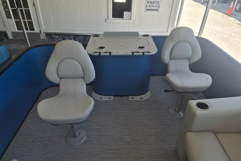 Slide: The Image of Interior of 2026 Sylvan Mirage Fish 820 Party Fish with two swivel chairs and a table. - 14