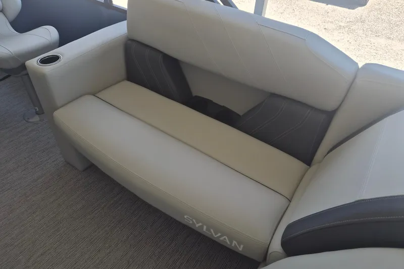 Slide: The Image of 2026 Sylvan Mirage Fish 820 Party Fish boat seat with cup holder, featuring sleek design. - 12