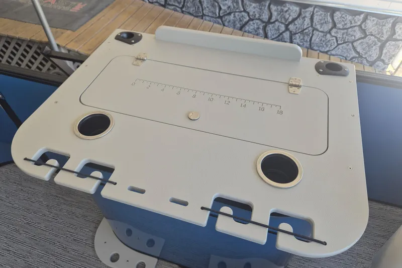 Slide: The Image of Fishing station on 2026 Sylvan Mirage Fish 820 Party Fish boat with cup holders and measuring scale. - 16