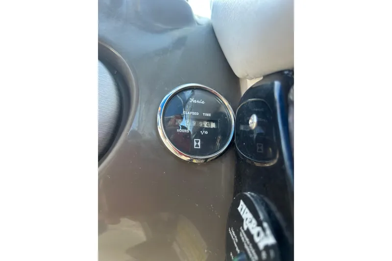 Slide: The Image of Close-up of a 2009 Regal 2400 Bowrider hour meter showing 941 hours. - 28