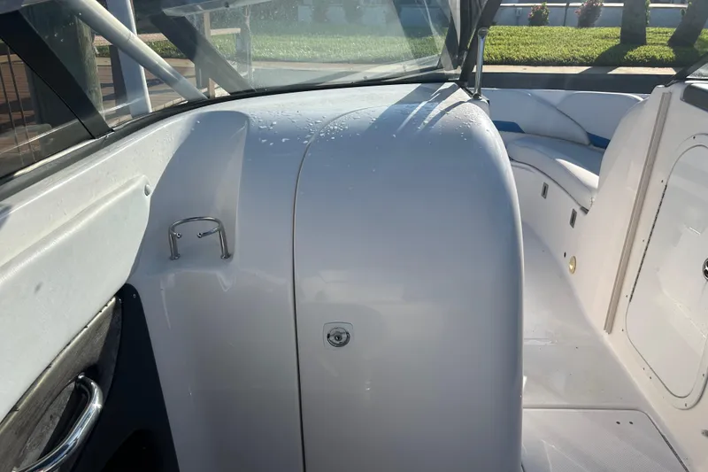 Slide: The Image of 2009 Regal 2400 Bowrider interior, showcasing sleek design and comfortable seating. - 31