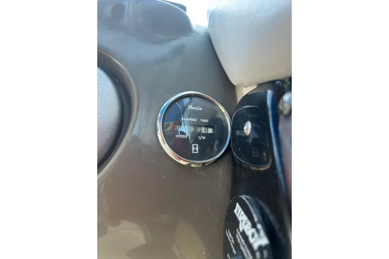 Slide: The Image of Dashboard of 2009 Regal 2400 Bowrider showing elapsed time gauge. - 29