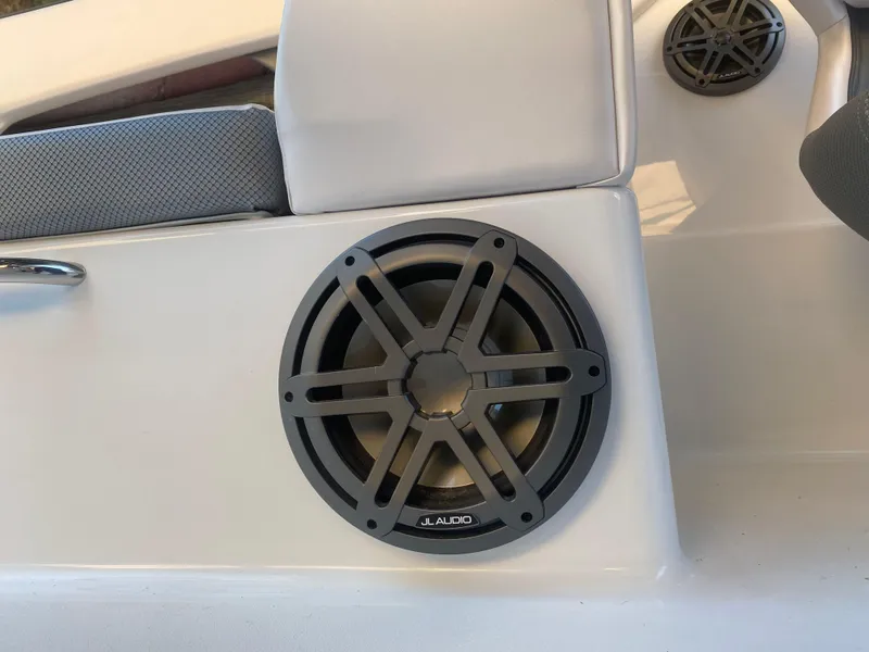 Slide: The Image of JL Audio speaker on 2025 Scarab 255 ID boat interior. - 30