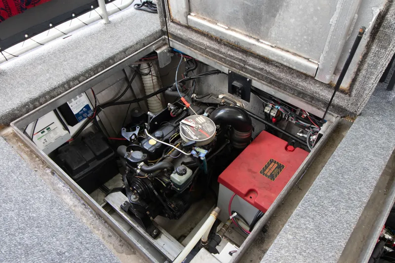 Slide: The Image of Engine compartment of 2001 Stardust Cruisers Executive Aft Cabin, showcasing mechanical components. - 54