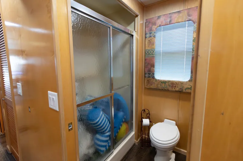 Slide: The Image of Bathroom in 2001 Stardust Cruisers Executive Aft Cabin with shower and toilet. - 36