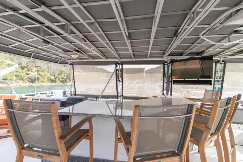 Slide: The Image of Spacious outdoor seating on 2001 Stardust Cruisers Executive Aft Cabin houseboat. - 62