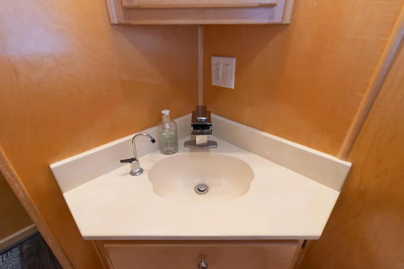 Slide: The Image of Compact bathroom sink in 2001 Stardust Cruisers Executive Aft Cabin boat. - 34