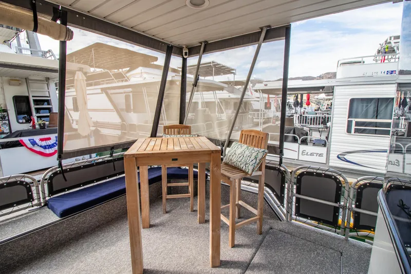 Slide: The Image of Outdoor seating area on 2001 Stardust Cruisers Executive Aft Cabin houseboat. - 4
