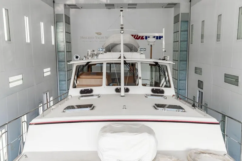 Slide: The Image of 2012 Dettling Motoryacht in a modern indoor facility, showcasing sleek design and craftsmanship. - 9