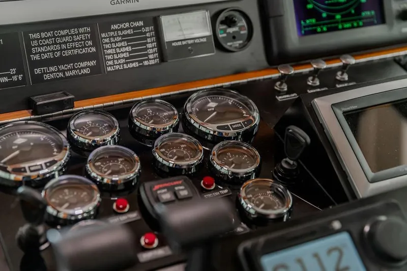 Slide: The Image of Control panel of a 2012 Dettling Motoryacht with gauges and navigation equipment. - 16