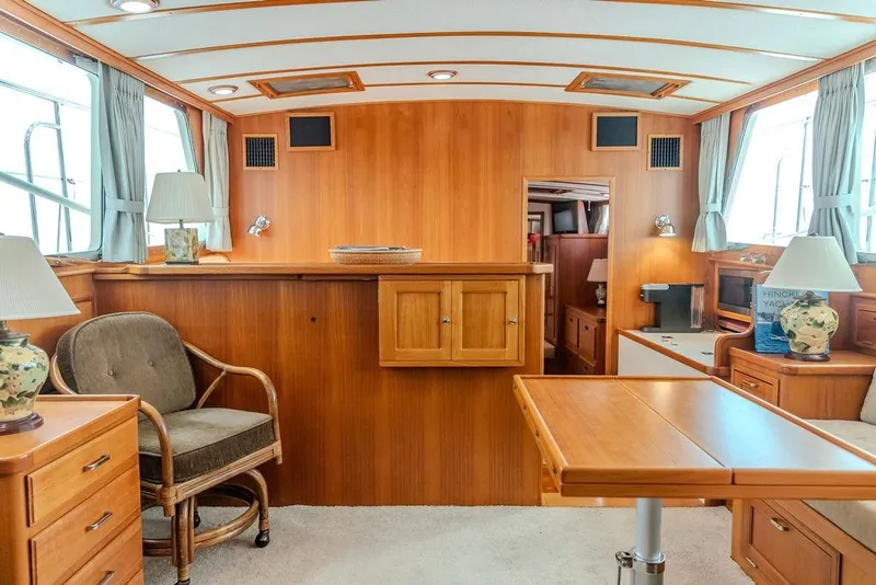 Slide: The Image of Luxurious 2012 Dettling Motoryacht interior with elegant wood finish and comfortable seating. - 3