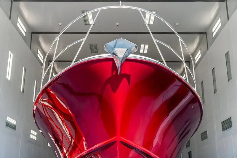 Slide: The Image of Red 2012 Dettling Motoryacht in a modern indoor facility. - 7