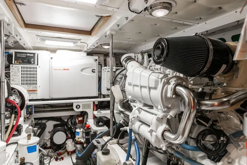 Slide: The Image of Engine room of a 2012 Dettling Motoryacht featuring a Cummins Onan generator. - 41