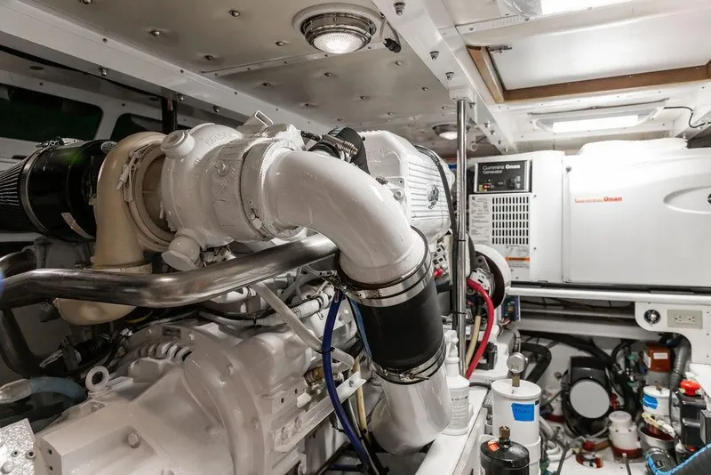 Slide: The Image of Engine room of 2012 Dettling Motoryacht with Cummins Onan generator and mechanical components. - 42