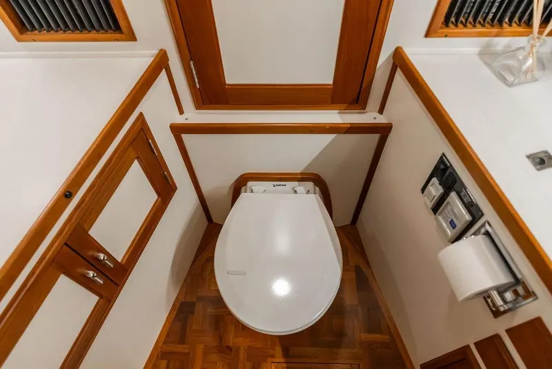 Slide: The Image of Luxurious bathroom interior of 2012 Dettling Motoryacht with modern toilet and wooden accents. - 38